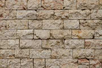 Textured old red brick wall