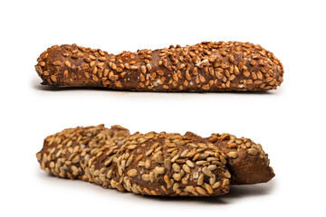 Loaf of bread with sunflower seeds isolated on a white background.