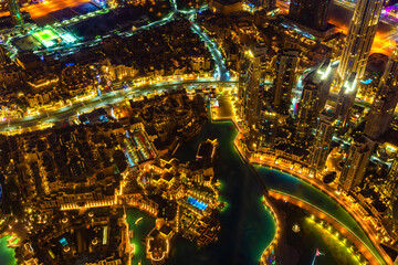 Downtown Dubai at night. Scenic aerial view on highways and skyscrapers