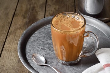 Hot drink tea with milk Malay called Teh Tarik is a popular breakfast drink in Malaysia