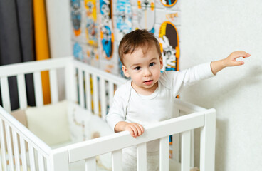 Child having fun with learning. Playful kid in room.