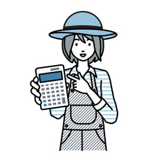 立って電卓を指差してこちらに向けて見せている農家の女性