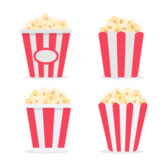 Popcorn in a red and white paper cup Snacks while watching movies in the cinema - obrazy, fototapety, plakaty
