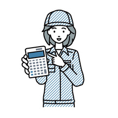立って電卓を指差してこちらに向けて見せている作業員の女性