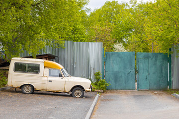 Moscow, Russia - May 05, 2023: an old van stands near the gate