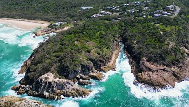 High Fly Over Rocky Cliffs with Blue Waves Crashing, Stradbroke Island, Point Lookout, North Gorge
