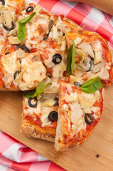 italian vegetarian pizza with zucchini mushrooms olives and cheese