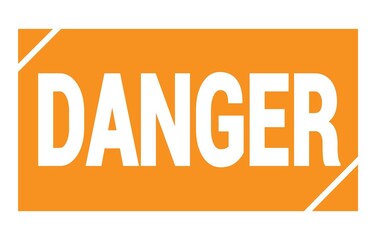DANGER text written on orange stamp sign.
