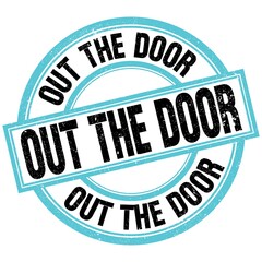 OUT THE DOOR text on blue-black round stamp sign