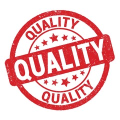 QUALITY text written on red round stamp sign.