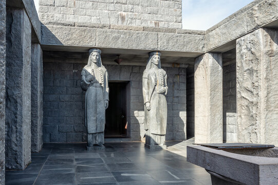 Two marble statues - female figures in national dress in the mausoleum of Negosh - Lovcen national park, Cetinje, Montenegro