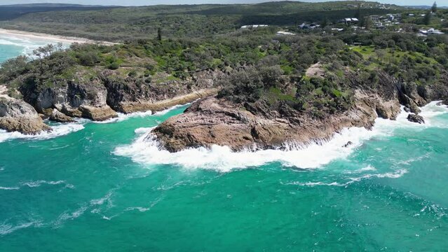 Low Fly By Blue Waves Crashing into Rocky Cliff, Stradbroke Island, Point Lookout, North Gorge