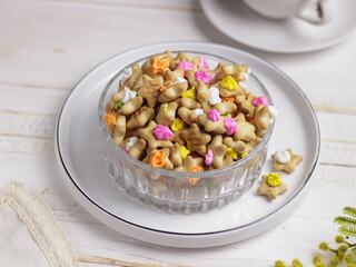 Selective focus of a bowl of sweet colorful ice gem rose cookies or in Malaysia they called it Biskut Ais Jem