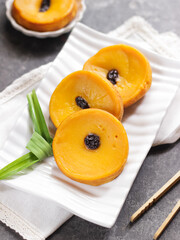 Kue Lumpur Labu Kuning, Indonesian traditional cake made from pumpkin, flour, coconut oil and eggs
