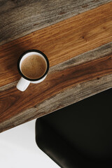 Flatlay mug with coffee with milk on wooden table. Aesthetic flat lay, top view still life...