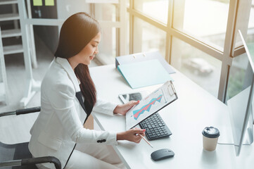 Close up of the girl working in the office by the desk. financial business concept, work in...