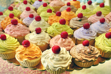 Assortment of multicolored typical sicilian pastries selective foreground focus