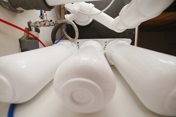 House water filtration system, Reverse osmosis. Installation or replacement cartridges of water...