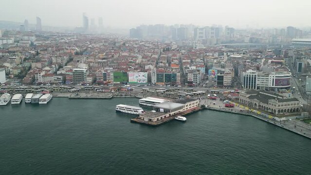 Kadikoy ferry terminal and bus station in Istanbul rotation shot