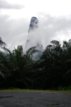 Dog peak mountain time clouds over the tropical vegetation, São Tomé e Principe