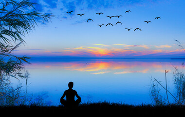 persona meditando en el lago  - obrazy, fototapety, plakaty
