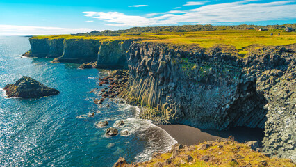 Panoramic over Snaefellsjoekull national park, Londrangar, Hellnar, sunset and Icelandic colorful and wild landscape in Iceland