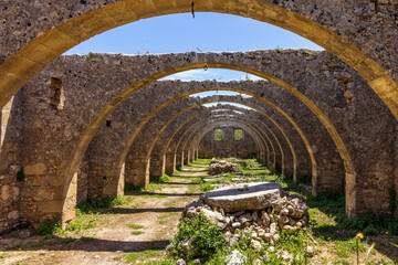 Arches of the old abandoned olive press, Agios Georgios (Saint George) monastery, Karydi, Apokoronas, Crete, Greece