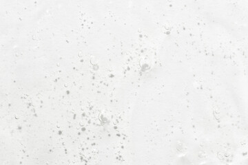 The texture of the serum or gel. Transparent cream with bubbles in the background. Transparent cosmetic gel in close-up. .Oxygen bubbles. .