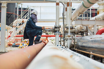 Male worker inspection at valve of visual check record pipeline oil and gas