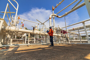 Male worker inspection at valve of visual check record pipeline oil and gas