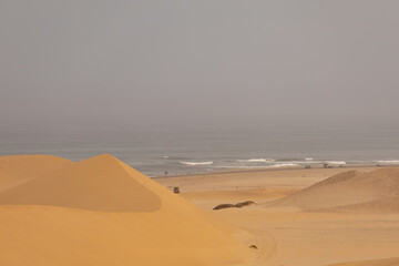 scenic view of the namib desert with the atlantic ocean in the background