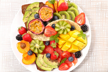 plate with dressing fruit salad- healthy eating, summer fruits