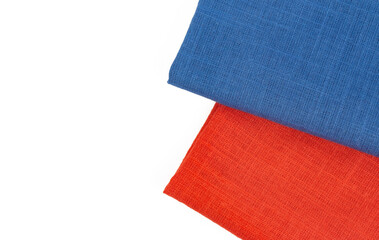 Blue and red fabrics on a white background