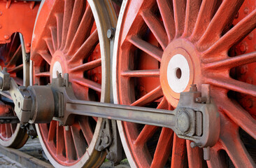 Big red wheels of steam locomotive