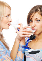 Pretty girls drinking vermouth, isolated