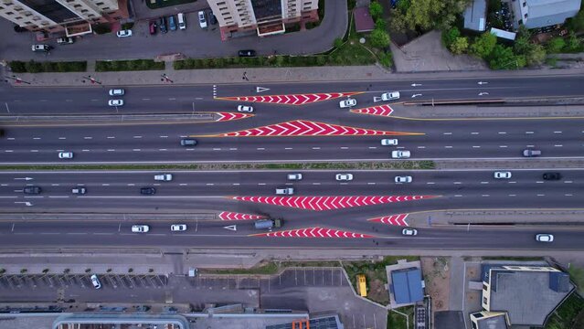 Top down aerial of cars drive at road. Nobody cityscape. Traffic highway transportation.