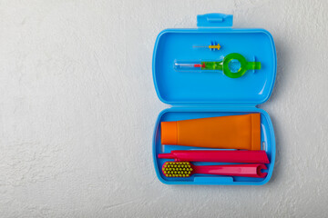 Oral care.Travel set with a toothbrush, toothbrush and toothpaste in a case.Composition on a...