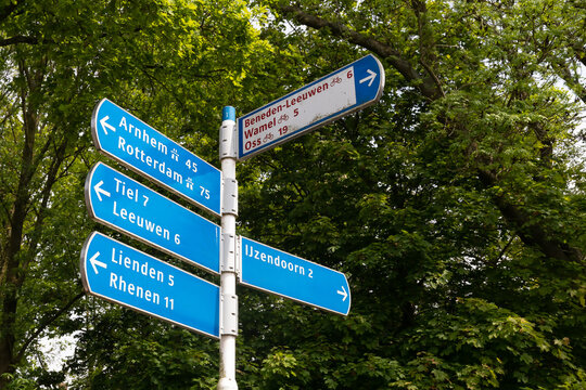 Signage to various destinations in the Netherlands.