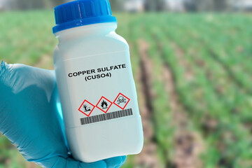  A blue crystalline compound used as a fungicide, herbicide, and pesticide in agriculture. It can also be used as a fertilizer supplement to treat copper deficiency in soils. - obrazy, fototapety, plakaty