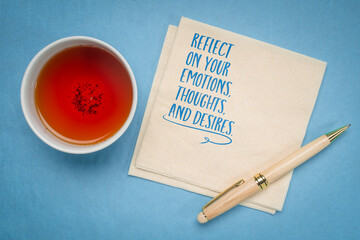 reflect on your emotions, thoughts, and desires - inspirational advice, handwriting on a napkin, personal development concept