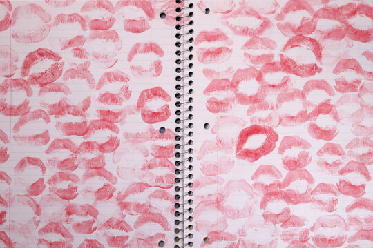 Notebook with lipstick kiss marks