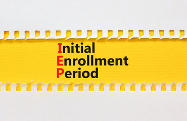 IEP symbol. Concept words IEP Initial enrollment period on beautiful yellow paper. Beautiful white...