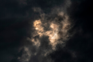 Fototapeta premium Dramatic sunset sky with dark clouds