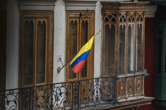 Colombian flag on the balcony of an old house
