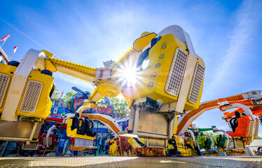 Munich, Germany - May 7: typical fairground rides and decoration at the annual spring festival...
