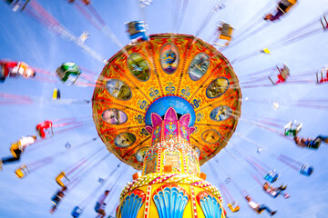 Munich, Germany - May 7: typical chain carousel and decoration at the annual spring festival...