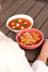 Table of italian meals on plates Pizza, pasta, ravioli, carpaccio, mushroom risotto, caprese salad and tomato bruschetta on rustic wooden background. Top view. Flat lay