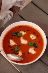 Table of italian meals on plates Pizza, pasta, ravioli, carpaccio, mushroom risotto, caprese salad and tomato bruschetta on rustic wooden background. Top view. Flat lay