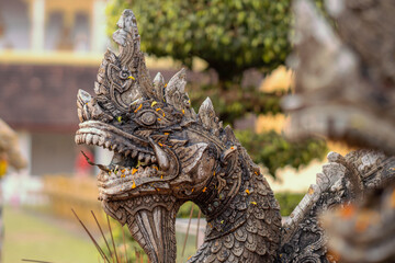 Naga head statue on the way up to the sanctuary of a Buddhist temple