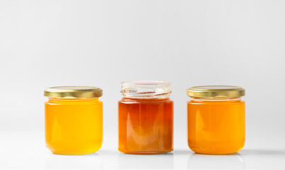 Composition of honey of different colors isolated.